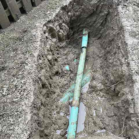 We located a clogged sewer line in utility right of way next to a power supply transformer. No room for backhoe or area to place spoils. Fear of damaging power lines.